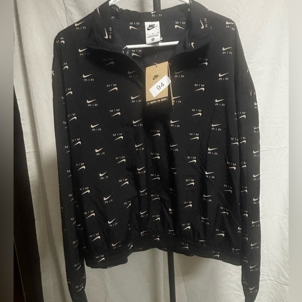 Nike Black Jacket with Subtle White Accents